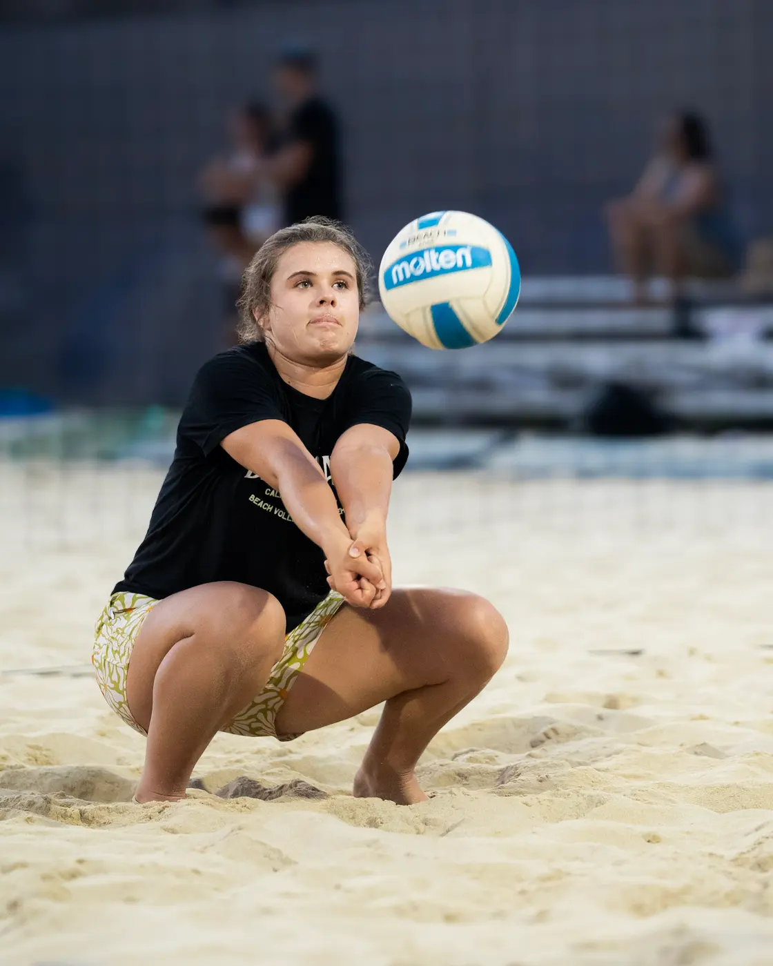 A Black Sand player settles under a ball to pass