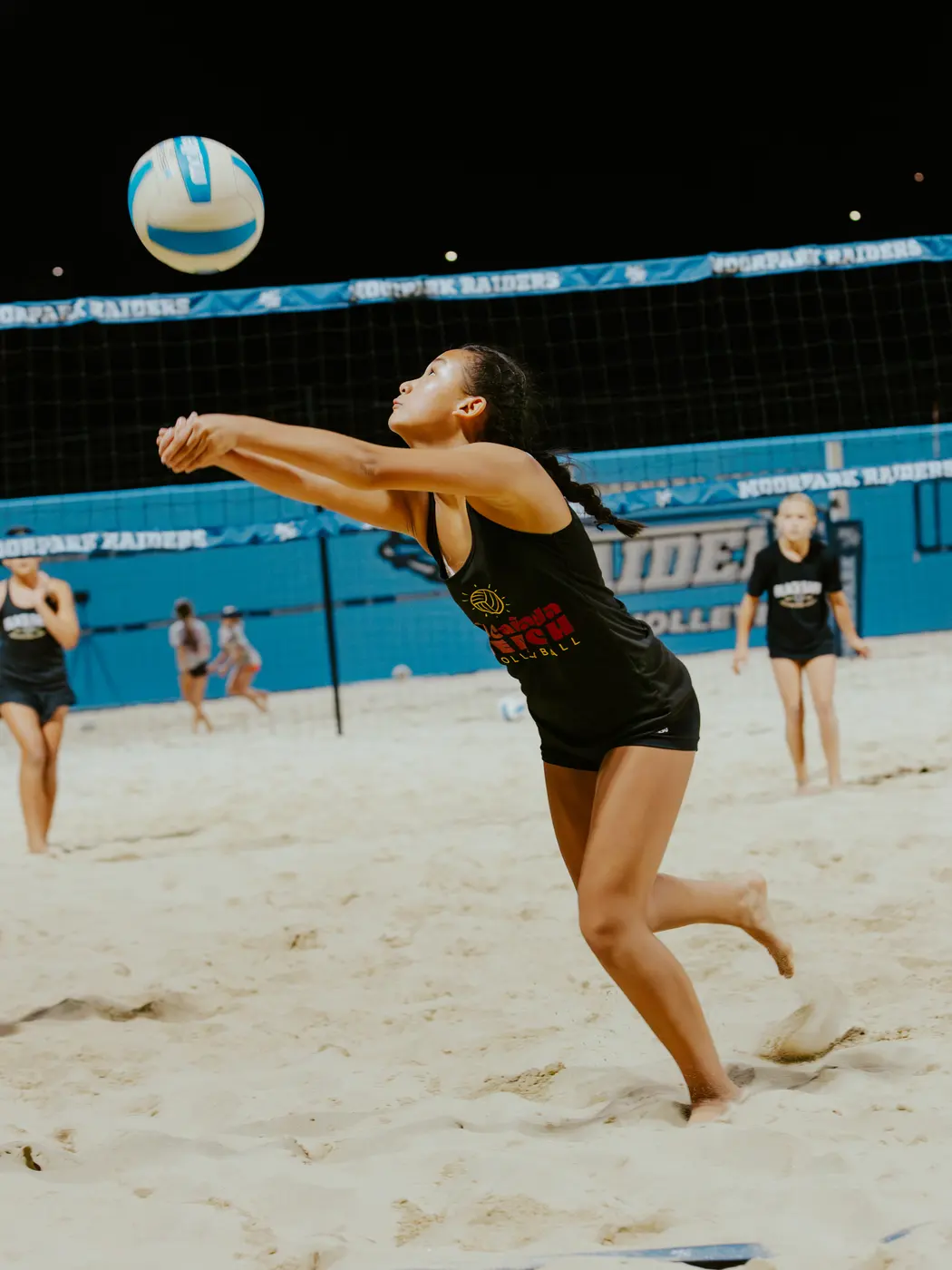 A player passes on the Moorpark courts