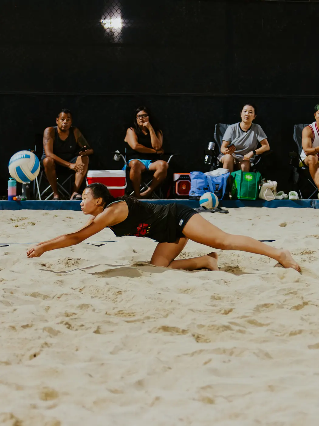 A player dives for a dig