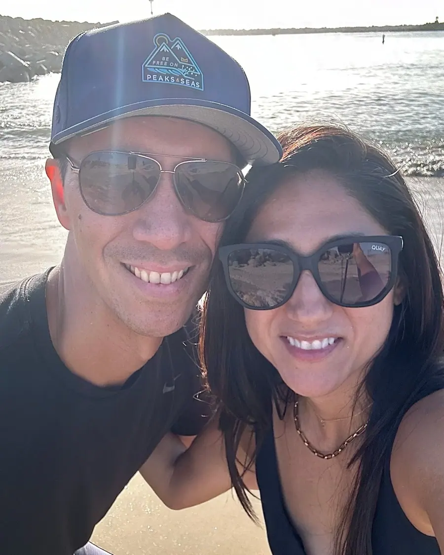 Adam and Crystal Black take a selfie on the beach